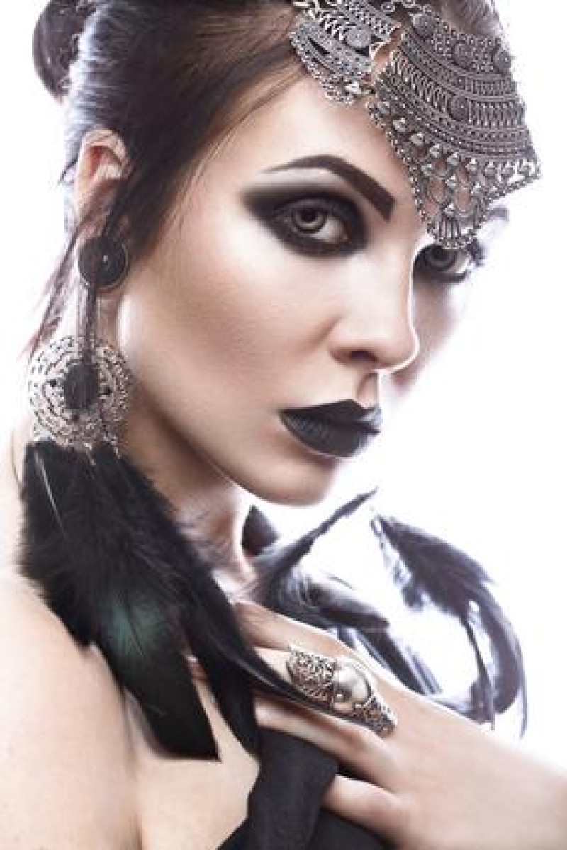 Beautiful girl in style of black queen. Image for a