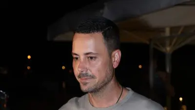 Παλιά φωτογραφία του Πέτρου Κουσουλού σε έξοδό του