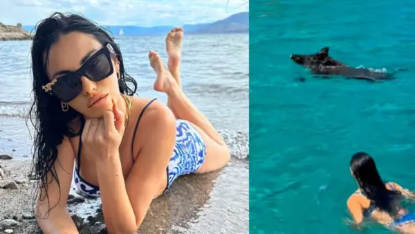 Η Δήμητρα Αλεξανδράκη στην παραλία μόνη της και μέσα στη θάλασσα ένα μαύρο γουρουνάκι