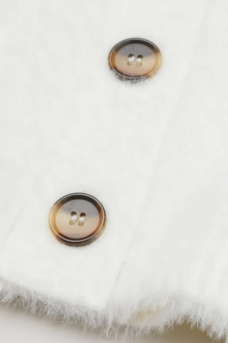 Άσπρη χνουδωτή ζακέτα από τα H&M