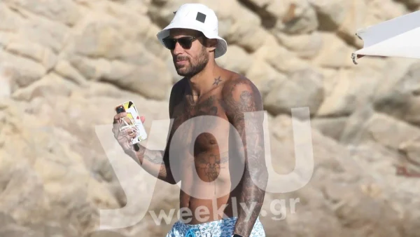 Καστανομάλλα με αέρινο φόρεμα - Σπάνια δημόσια εμφάνιση του Πρίντεζη με τη γυναίκα του στη Μύκονο