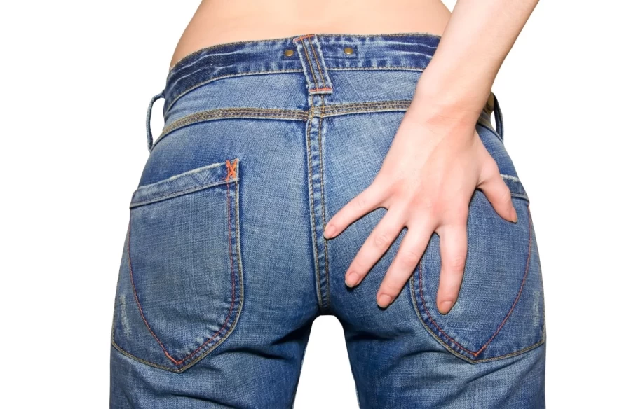 woman wear denim pants backside