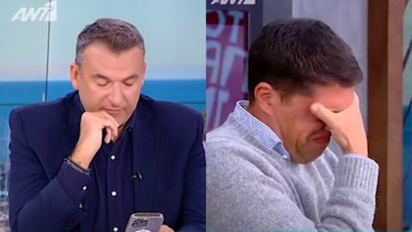 Ο Λιάγκας με σκυμμένο κεφάλι και ο Παπανδρέου κρύβει το πρόσωπό του για να μην φανεί το κλάμα του