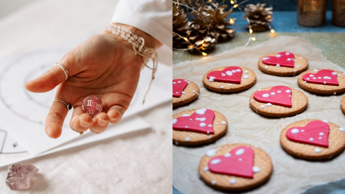 Ένα χέρι που κρατά ένα ζάρι με τα ζώδια και μπισκότα με σχήμα καρδιάς